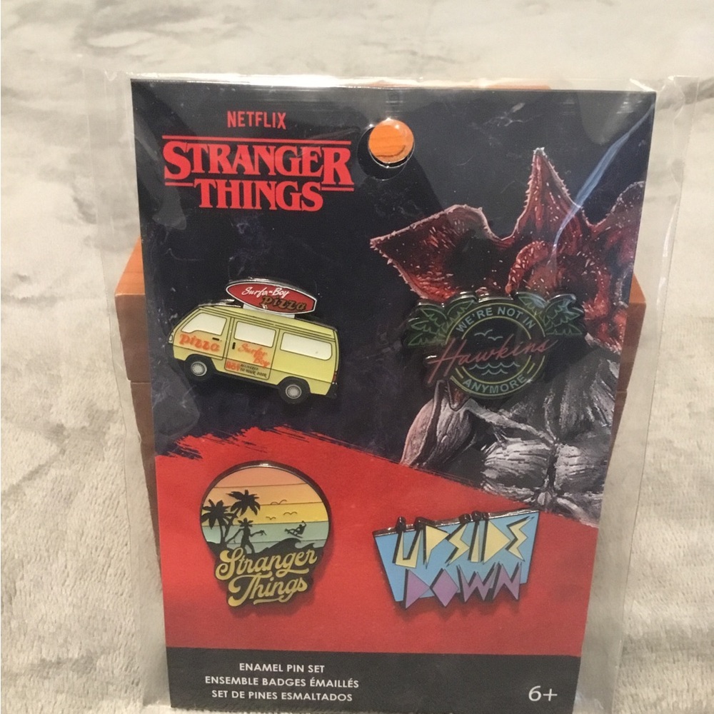 Netflix Stranger Things Pin Collection with Red and Orange Accents
